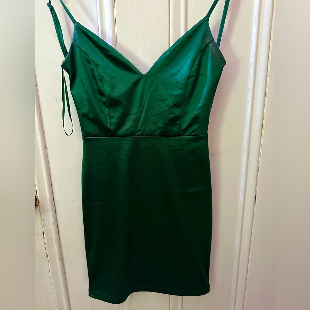 Dark green silky dress from Windsor, sized small women’s, not padded. Worn once